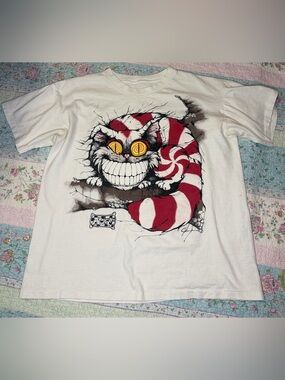 VTG 90s Andazia Alice in Wonderland Cheshire Cat We’re All Mad Graphic Tee L/XL